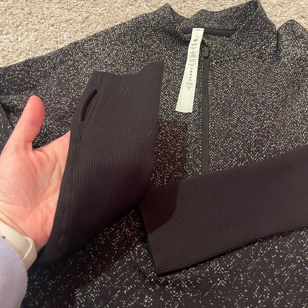 Lululemon cropped half zip. I have worn this 3 times